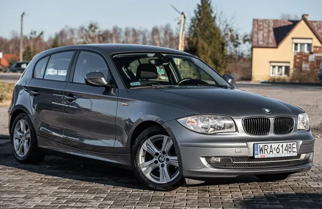 samochody osobowe BMW Seria 1 cena 19900 przebieg: 288000, rok produkcji 2010 z Radom